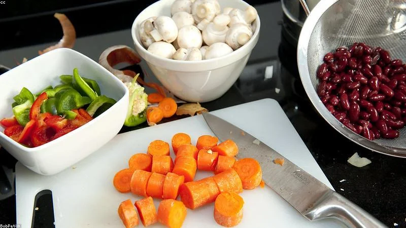 Chef chopping vegetable scraps